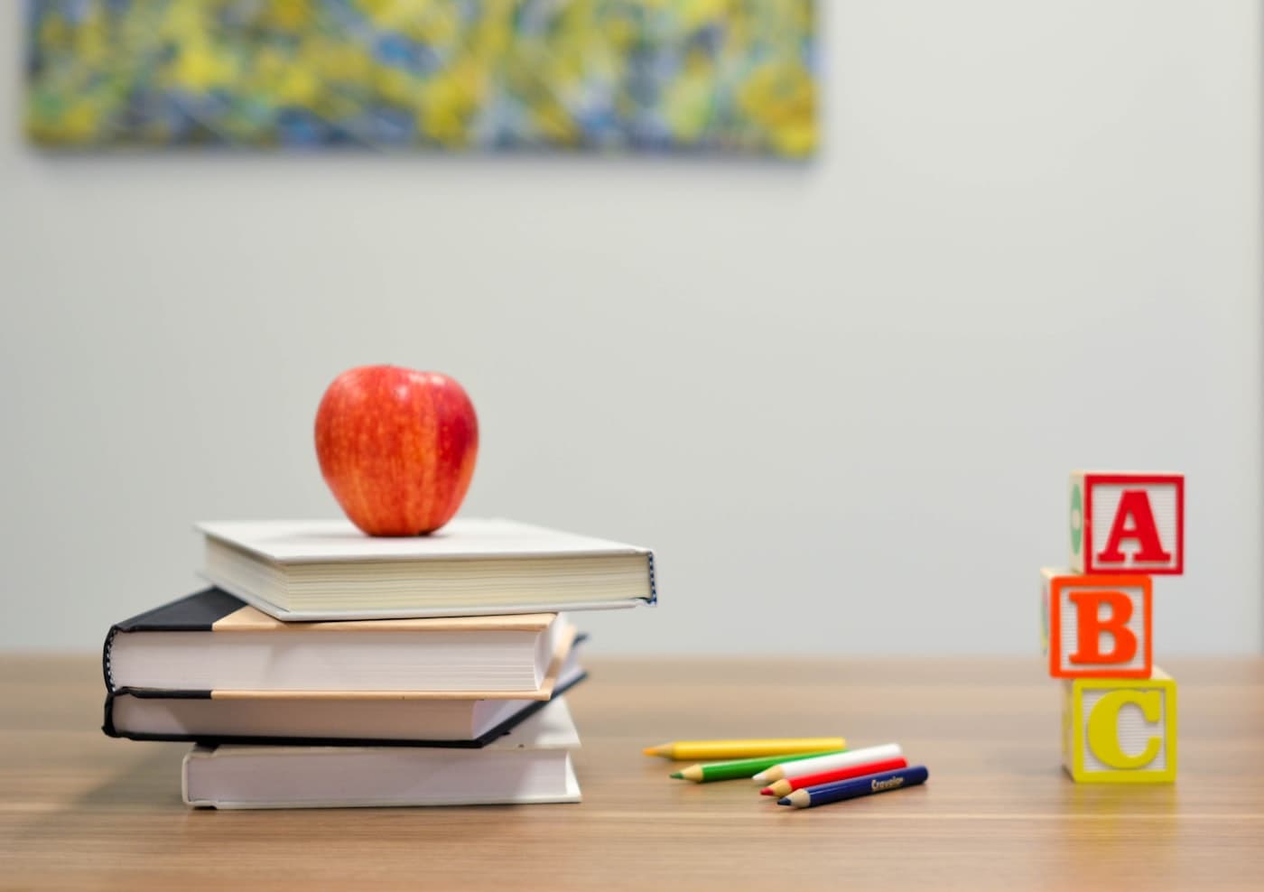 A candidate's desk with open books and study notes