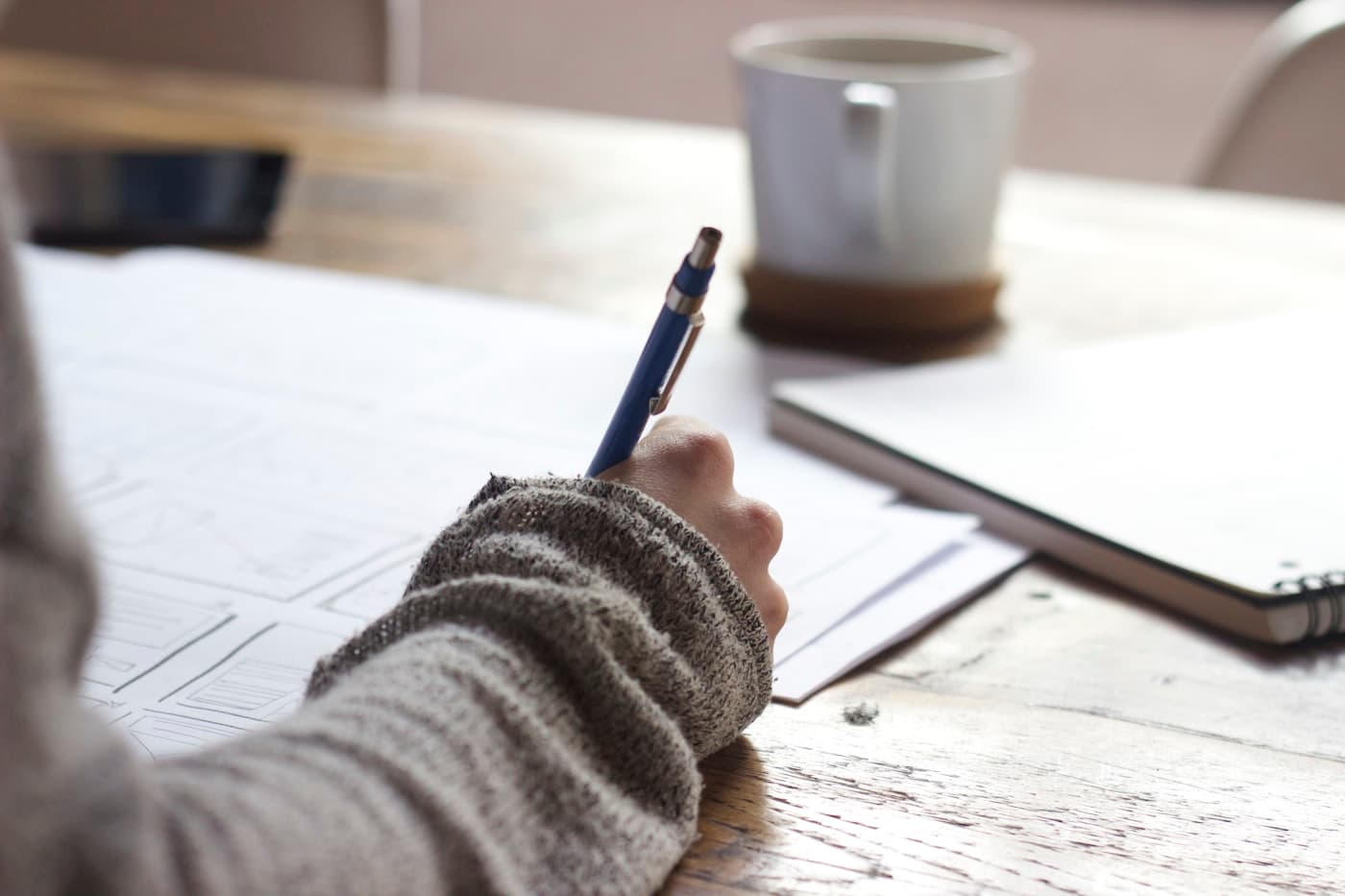 Handwritten revision notes in a notebook